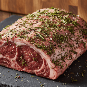 Prime rib uncooked with seasonings